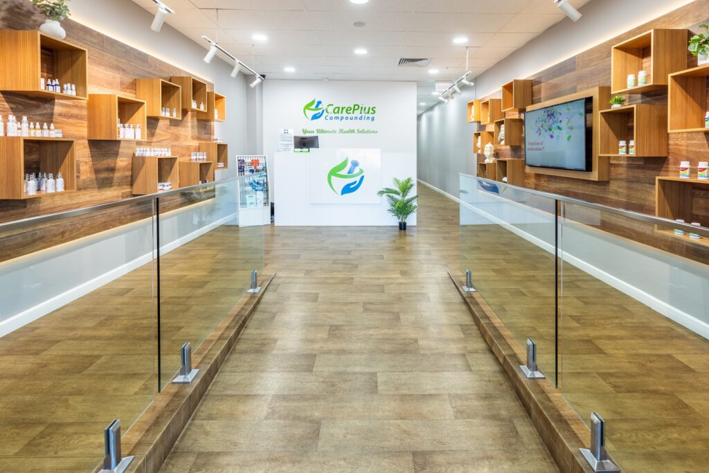 Inside the CarePlus Compounding Pharmacy in Narellan, looking down the entrance to the reception counter
