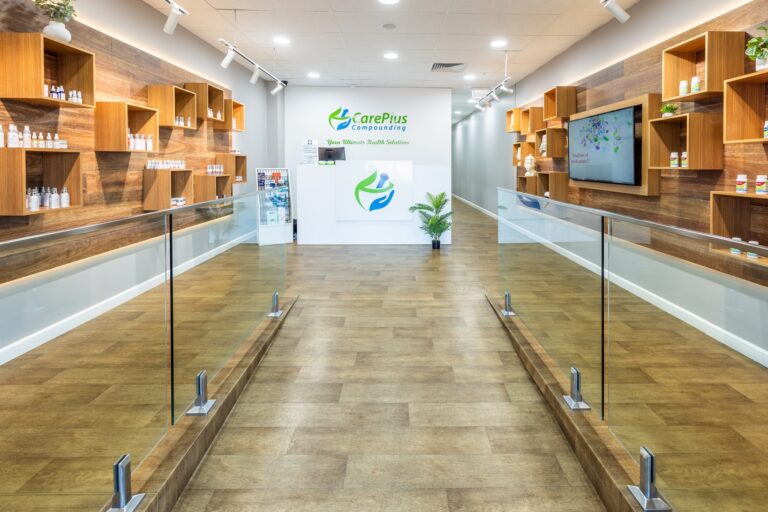 Inside the CarePlus Compounding Pharmacy in Narellan, looking down the entrance to the reception counter